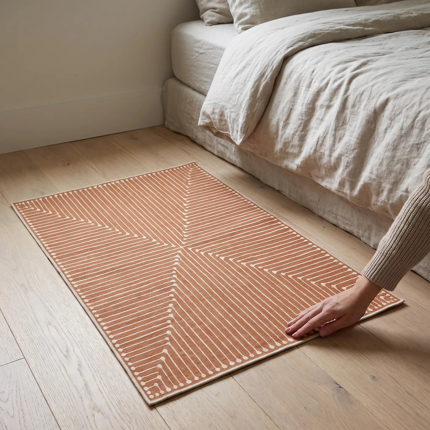 Inkdrop Copper Striped Rug shown in a home