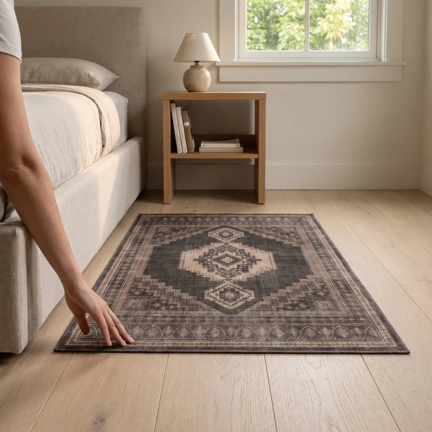 Rayne Charcoal & Tan Medallion Rug shown in a home