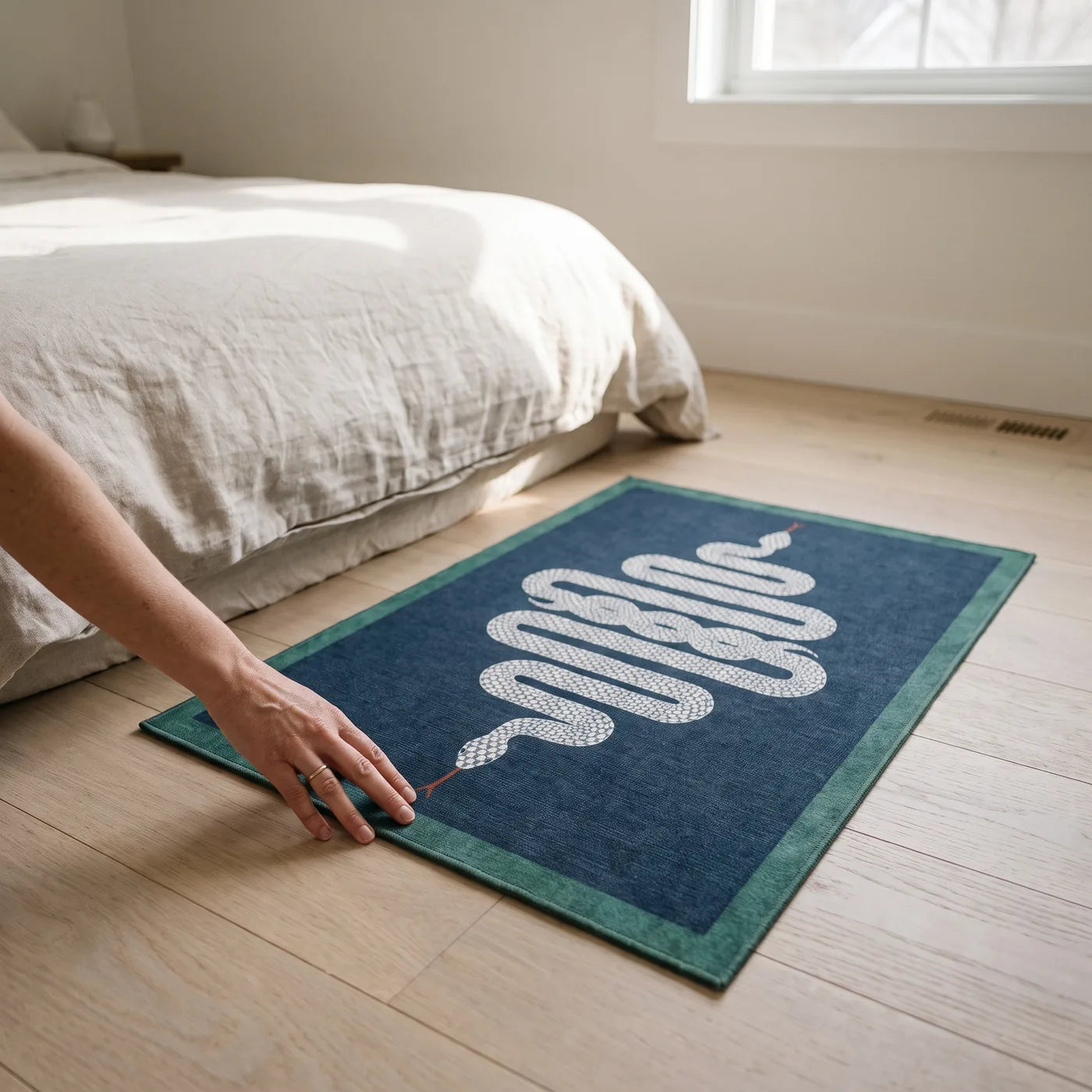Venom Sapphire Serpent Rug shown in a home
