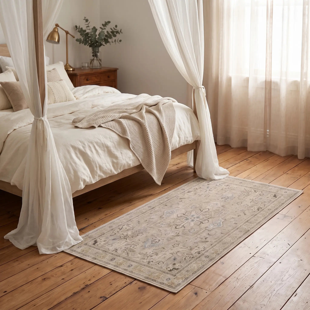 Kamran Ivory Opal Medallion Rug in a bedroom