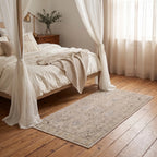 Kamran Ivory Opal Medallion Rug in a bedroom