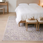 Montreal Beige and Lilac Floral Rug in a bedroom