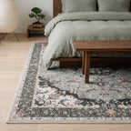 Sima Sage Rug in a bedroom